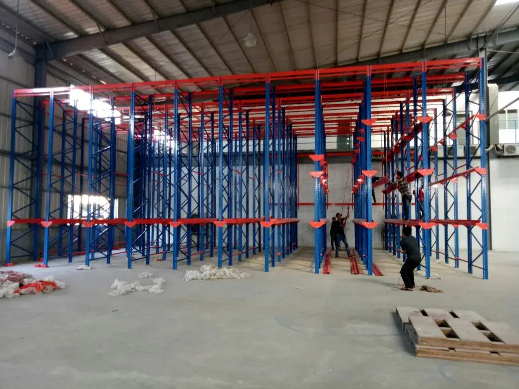 Rak Drive-In — Sistem first in last out. Hemat ruang, cocok untuk cold storage.